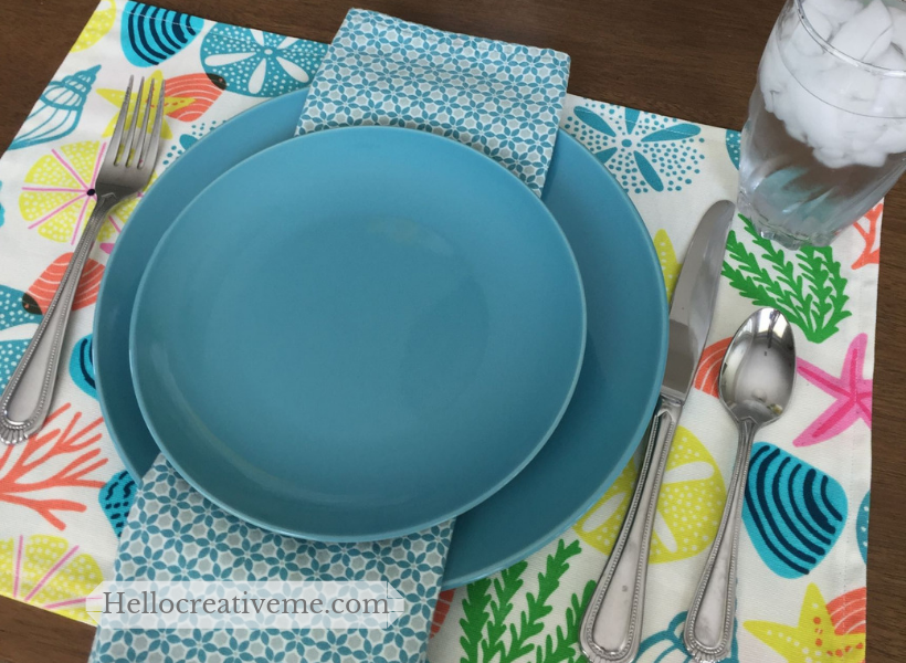 teal place setting on colorful DIY placemat