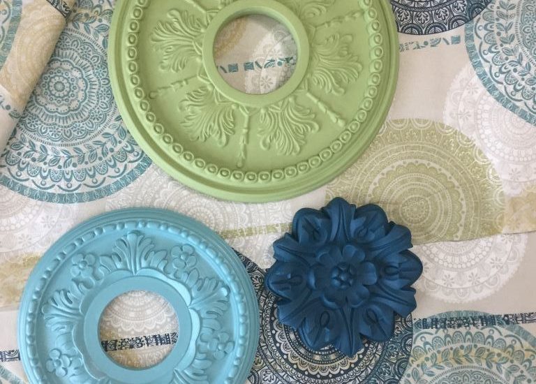 DIY painted ceiling medallions on top of curtain panel with suzani pattern
