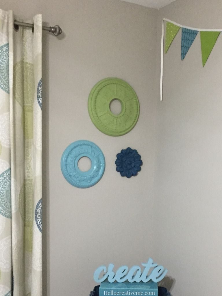 corner of room with DIY ceiling medallions as wall art