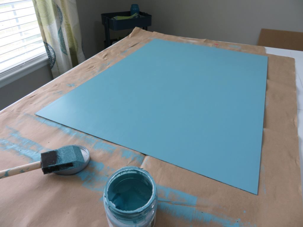 blue painted acrylic cover on table