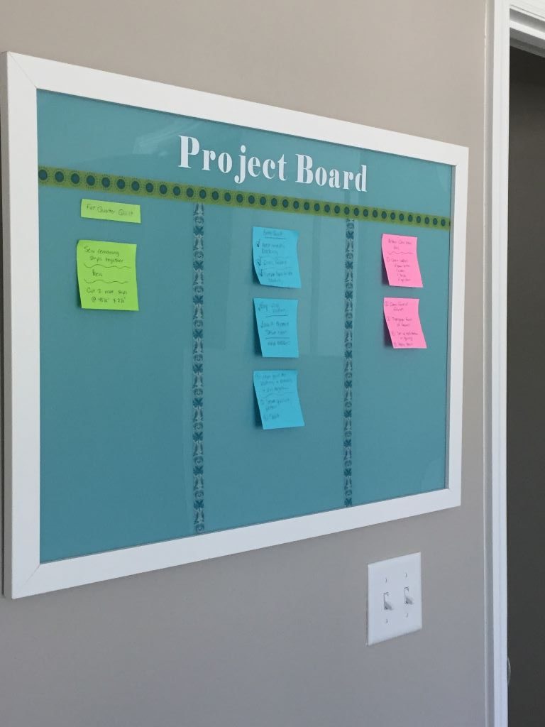 project board hanging on wall
