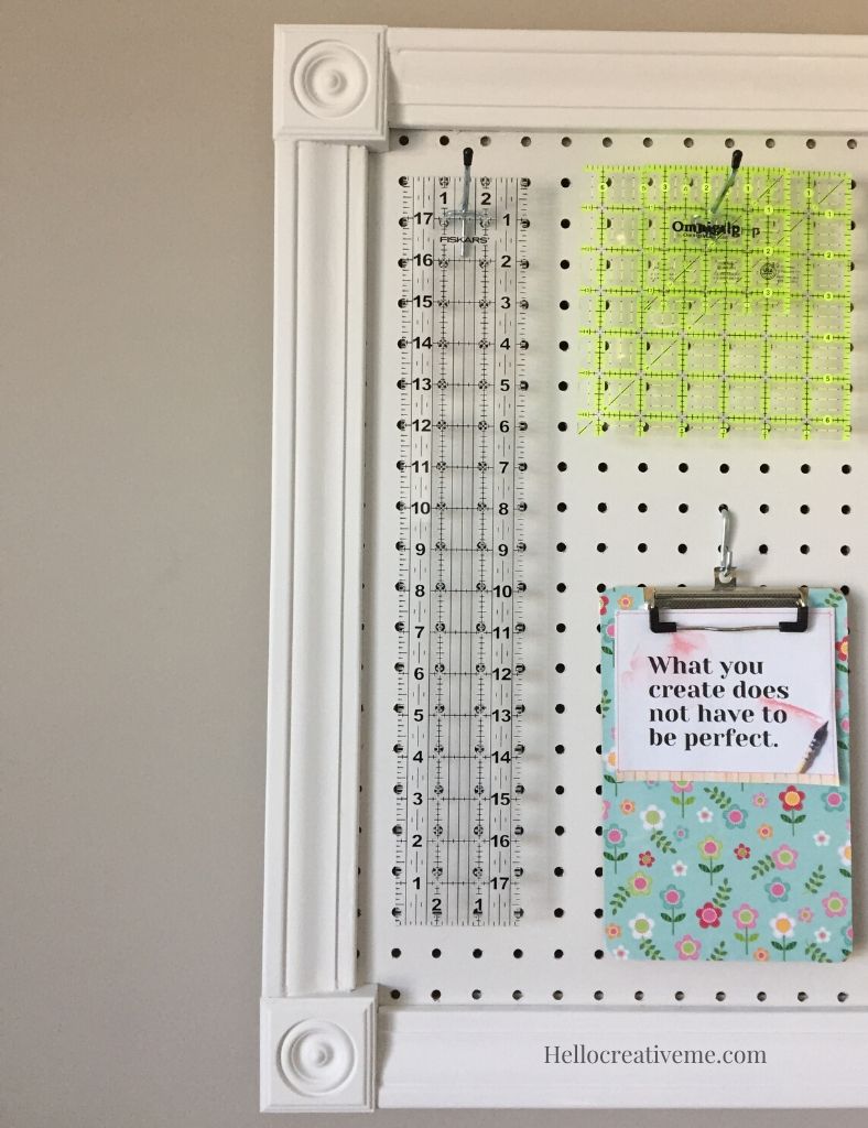 side view of framed pegboard