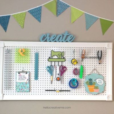 white DIY framed pegboard with tools