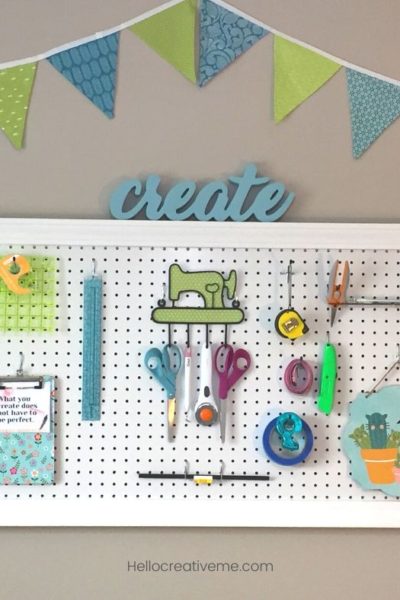 white DIY framed pegboard with tools