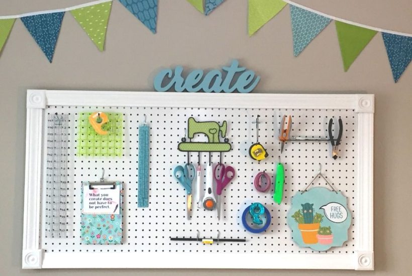 white DIY framed pegboard with tools