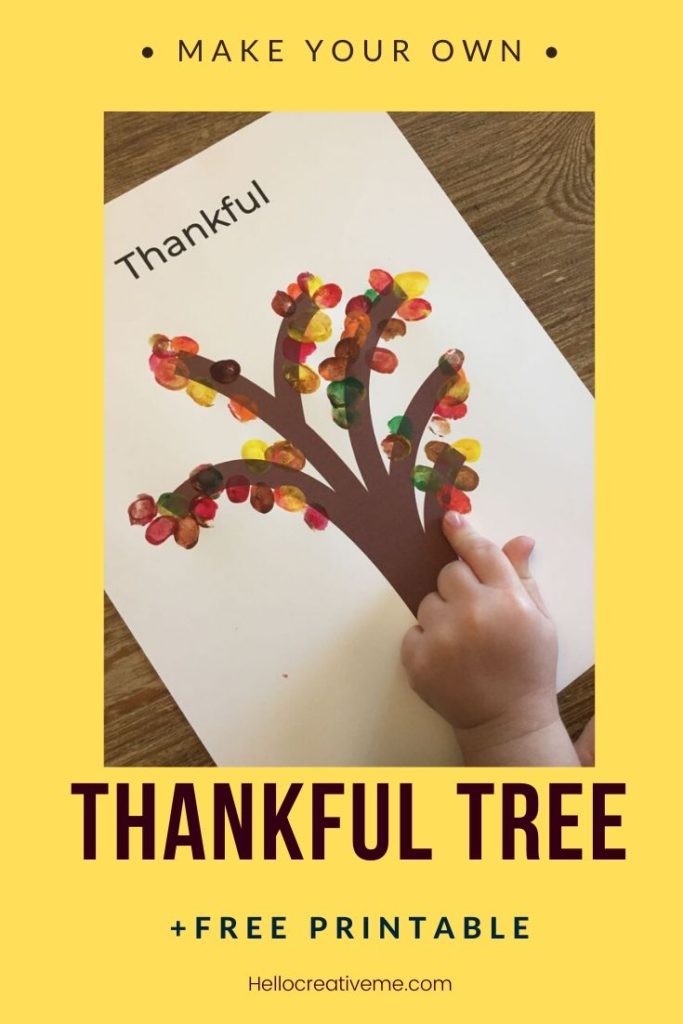 tree with colored fingerprinted leaves