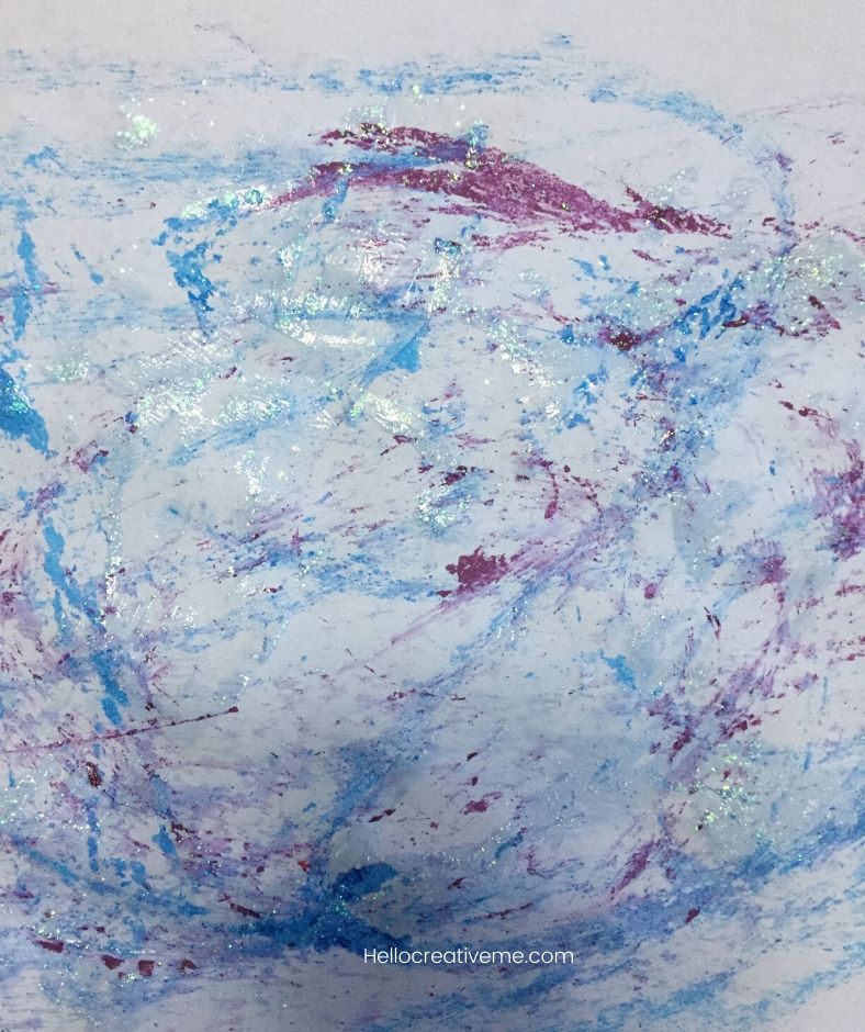 frozen ice cube art work in shades of blue and purple