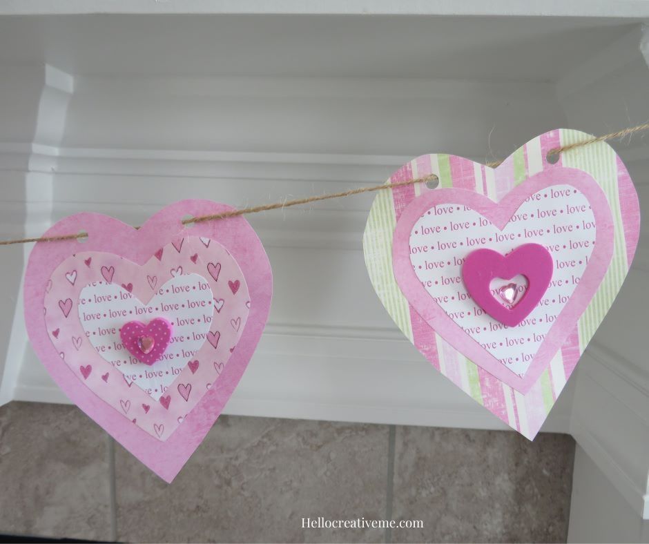 Close view of two paper hearts on twine