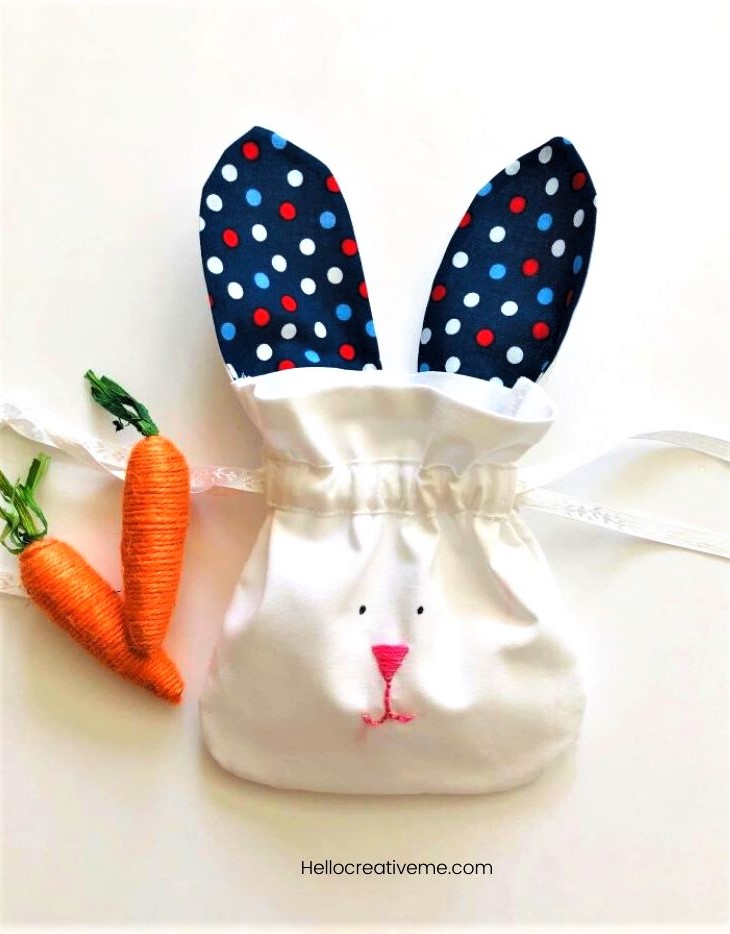 white DIY bunny Bag with Blue and Red polka dotted ears