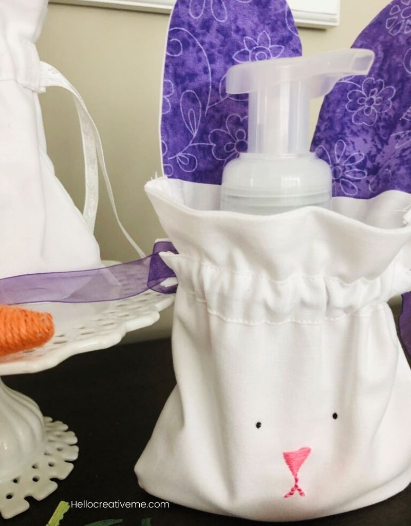 Bunny bag holding soap sitting on table