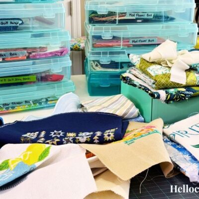 Unfinished Quilt Projects in Bins Scattered Across Table